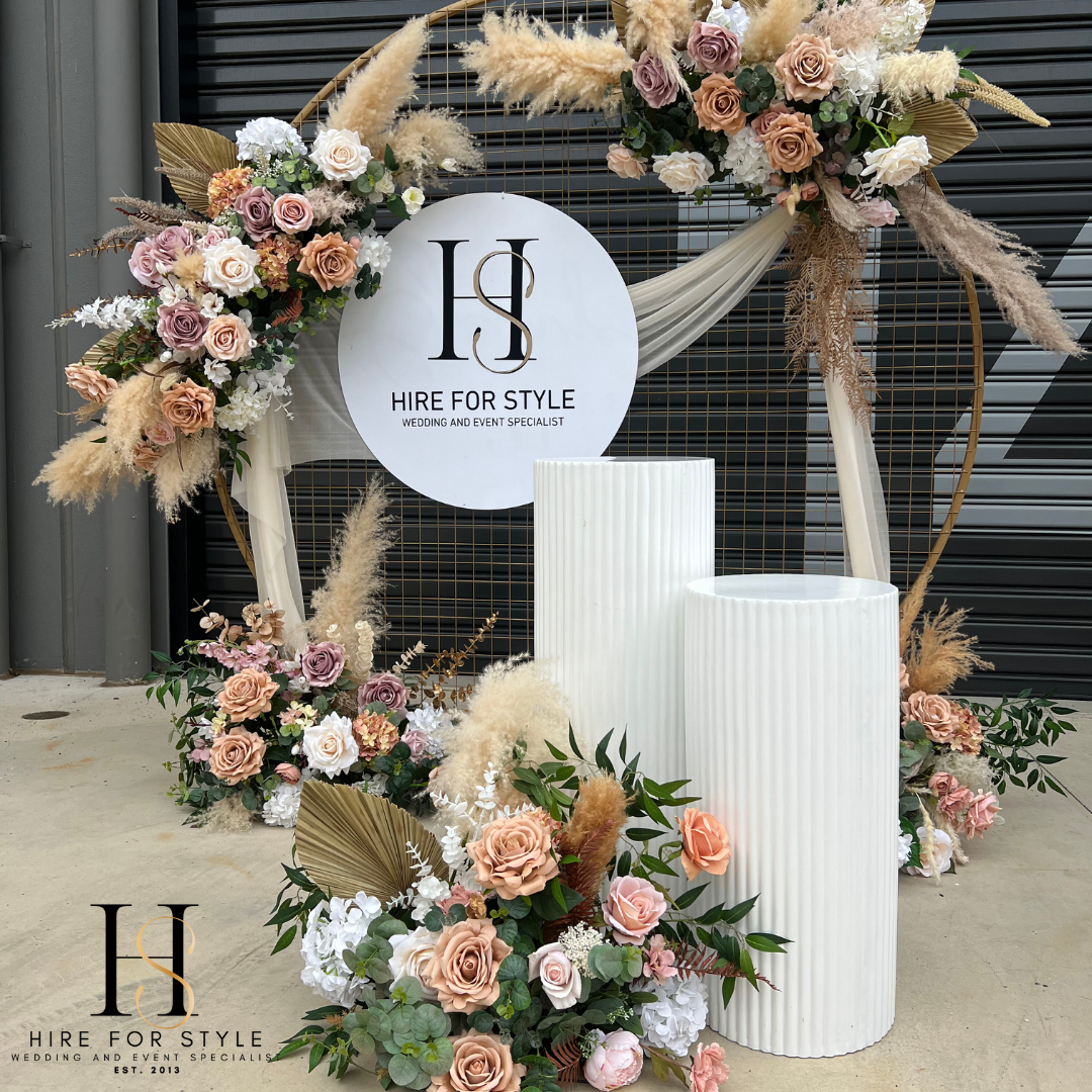 Gold Mesh Round Backdrop with Ripple Plinth and Florals