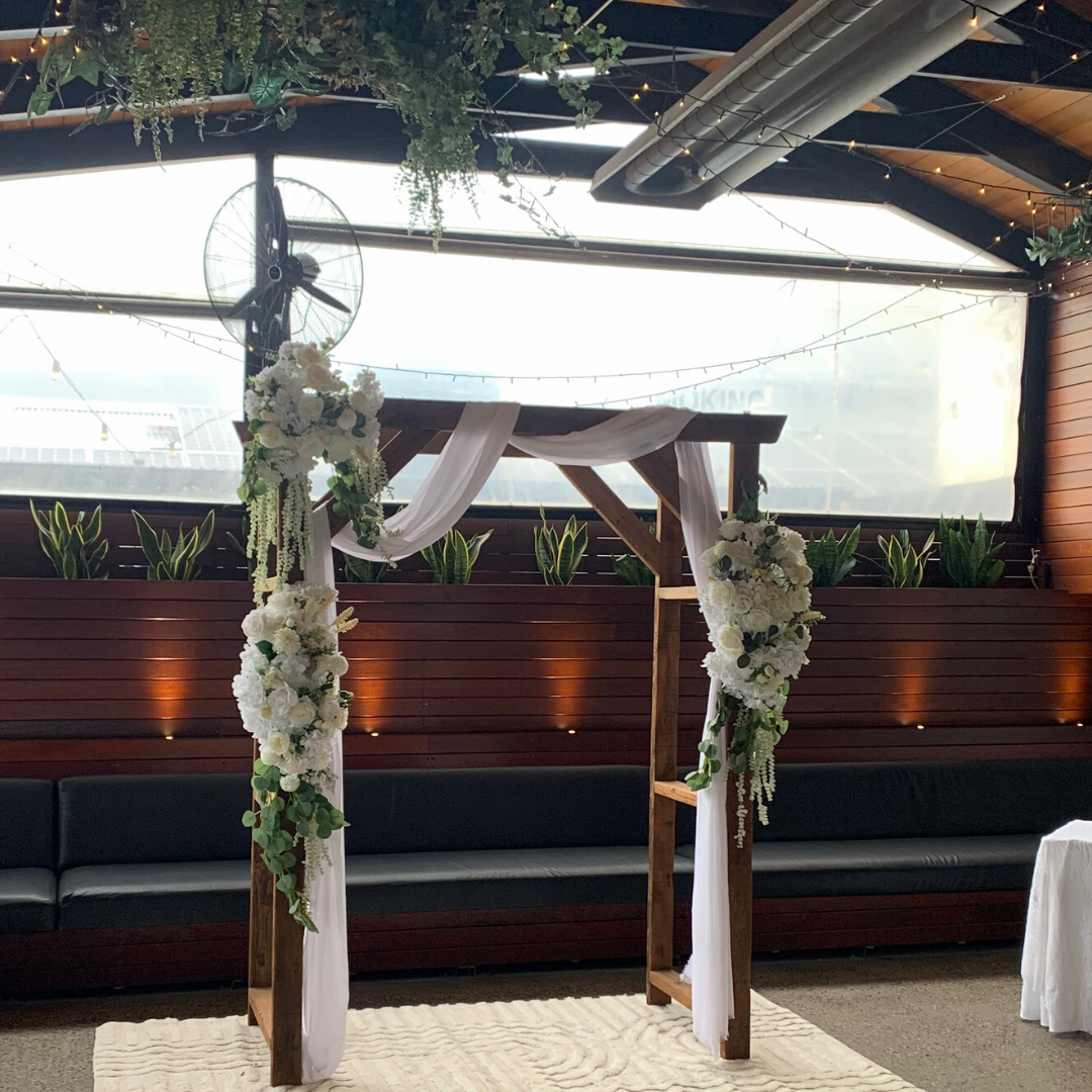 A103 Wedding Ceremony Package with Arbour, Carpet & White Crossback Chairs
