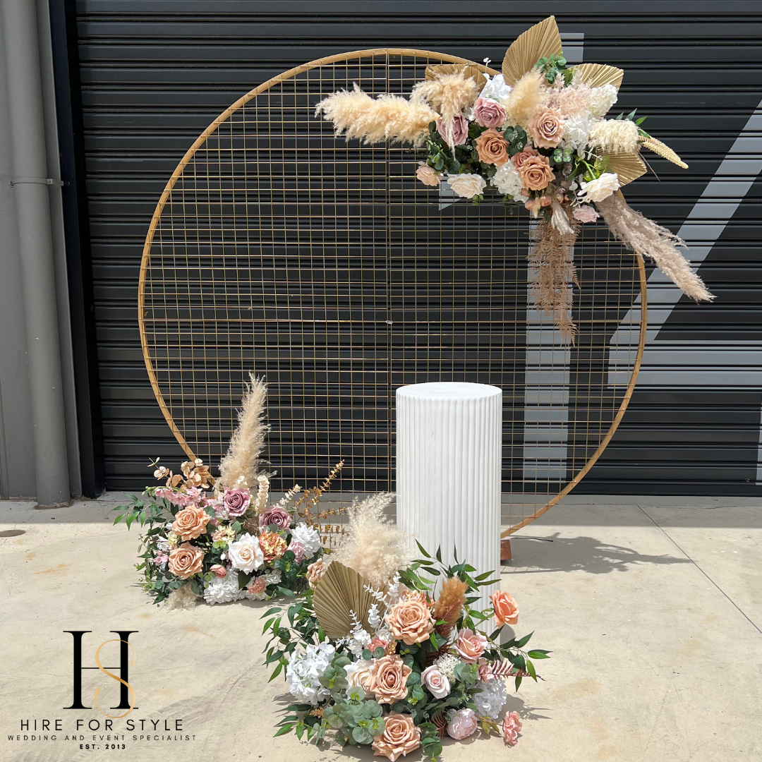 Gold Mesh Round Backdrop with Ripple Plinth and Florals