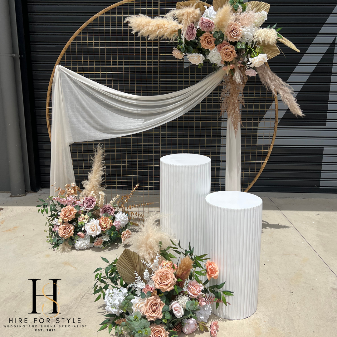 Gold Mesh Round Backdrop with Ripple Plinth and Florals