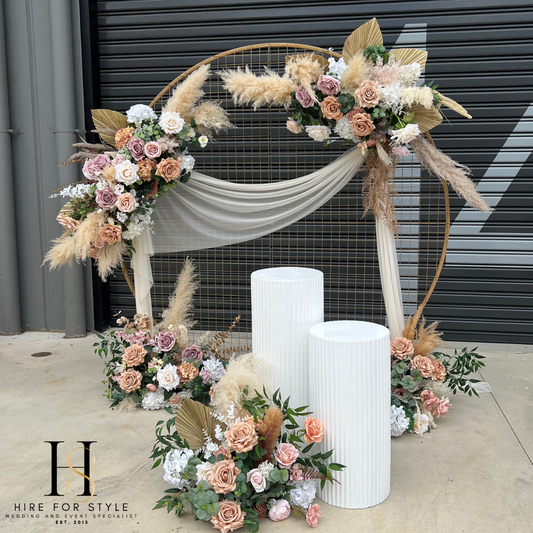 Gold Mesh Round Backdrop with Ripple Plinth and Florals