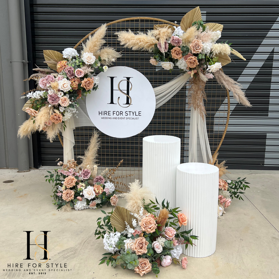 Gold Mesh Round Backdrop with Ripple Plinth and Florals