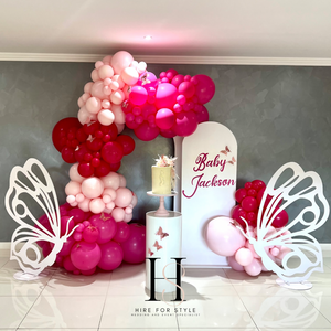 Double Arch Backdrop with Balloons, Signage and Large Butterflies
