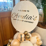 White Round Backdrop with Balloon Garland, Plinth & Signage
